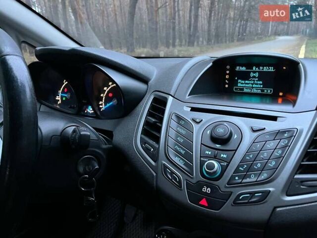 Білий Форд Фієста, об'ємом двигуна 1.5 л та пробігом 249 тис. км за 6500 $, фото 29 на Automoto.ua