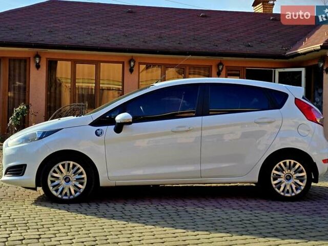 Білий Форд Фієста, об'ємом двигуна 1 л та пробігом 60 тис. км за 9999 $, фото 16 на Automoto.ua