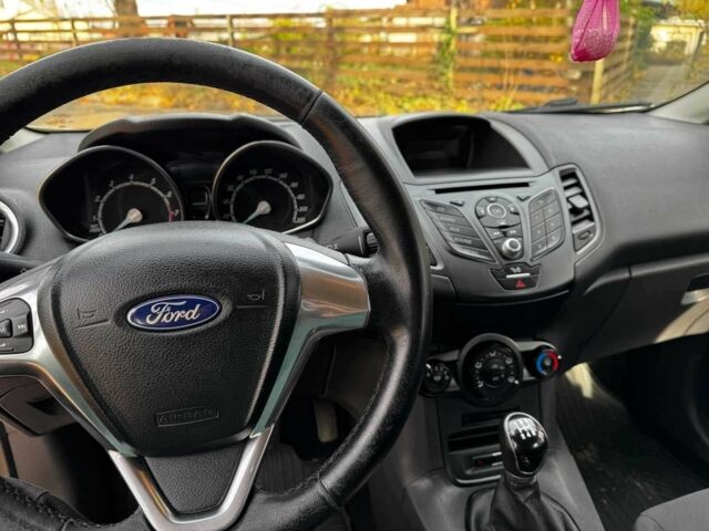 Белый Форд Фиеста, объемом двигателя 1.4 л и пробегом 149 тыс. км за 6940 $, фото 19 на Automoto.ua