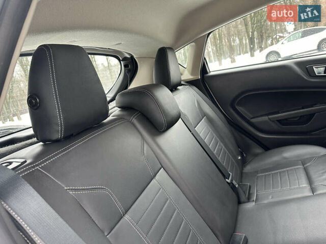 Білий Форд Фієста, об'ємом двигуна 1.6 л та пробігом 90 тис. км за 9400 $, фото 17 на Automoto.ua