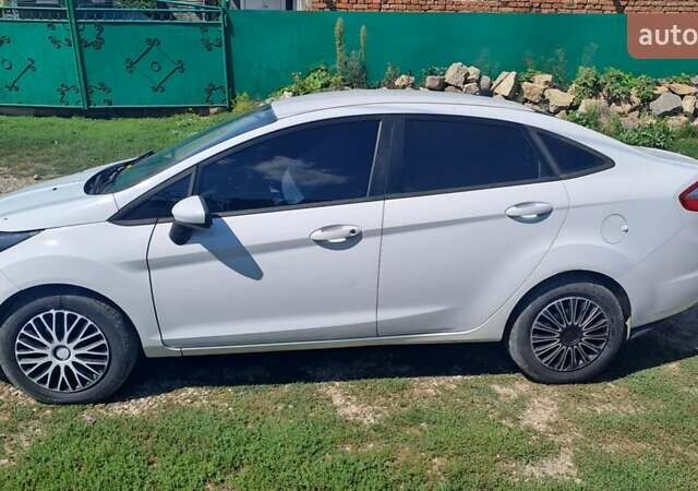 Белый Форд Фиеста, объемом двигателя 1.6 л и пробегом 119 тыс. км за 7100 $, фото 6 на Automoto.ua