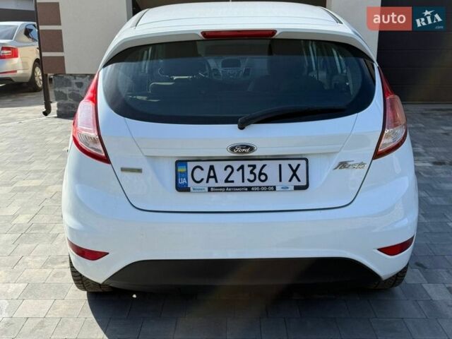 Белый Форд Фиеста, объемом двигателя 1 л и пробегом 130 тыс. км за 7700 $, фото 8 на Automoto.ua