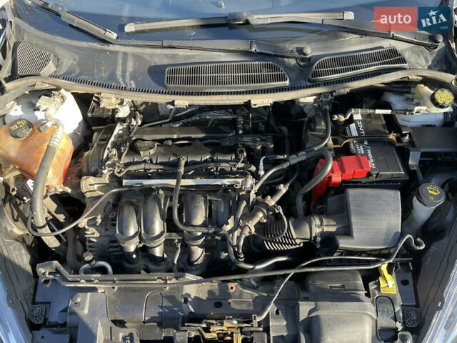 Белый Форд Фиеста, объемом двигателя 1.6 л и пробегом 153 тыс. км за 7000 $, фото 11 на Automoto.ua