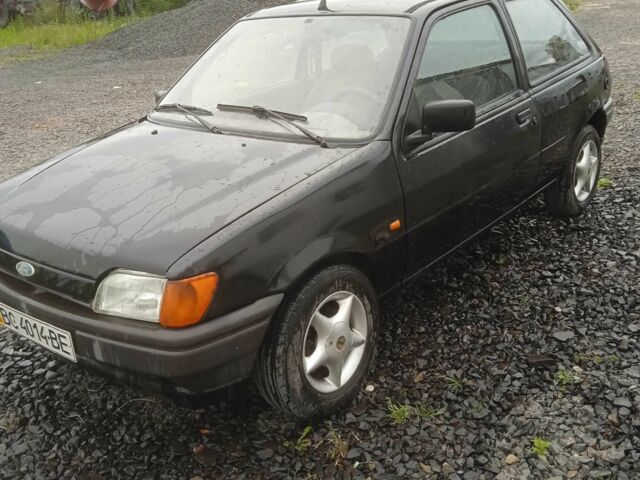 Черный Форд Фиеста, объемом двигателя 1.1 л и пробегом 250 тыс. км за 1000 $, фото 1 на Automoto.ua