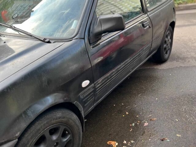 Черный Форд Фиеста, объемом двигателя 1.3 л и пробегом 854 тыс. км за 750 $, фото 8 на Automoto.ua