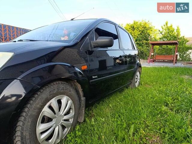 Черный Форд Фиеста, объемом двигателя 1.4 л и пробегом 265 тыс. км за 3200 $, фото 1 на Automoto.ua