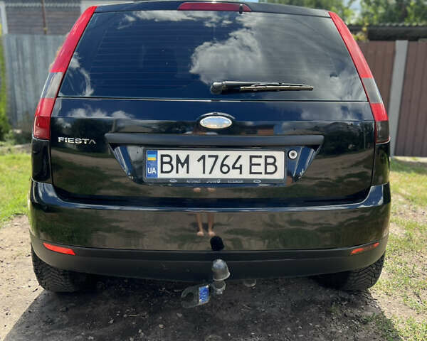 Черный Форд Фиеста, объемом двигателя 1.3 л и пробегом 232 тыс. км за 3800 $, фото 3 на Automoto.ua