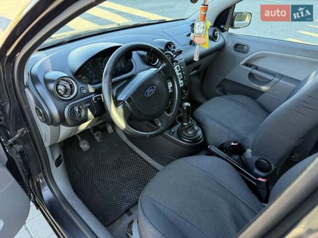 Черный Форд Фиеста, объемом двигателя 1.4 л и пробегом 155 тыс. км за 2999 $, фото 21 на Automoto.ua