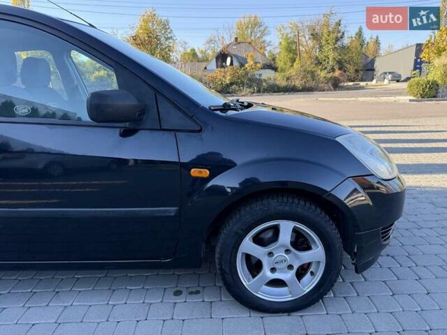 Черный Форд Фиеста, объемом двигателя 1.4 л и пробегом 155 тыс. км за 2999 $, фото 11 на Automoto.ua