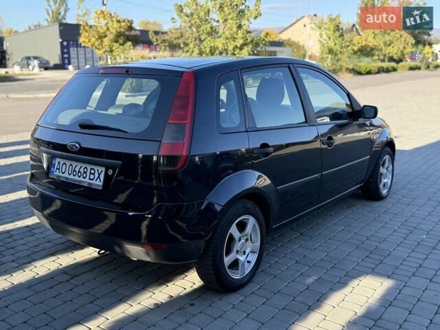 Черный Форд Фиеста, объемом двигателя 1.4 л и пробегом 155 тыс. км за 2999 $, фото 15 на Automoto.ua