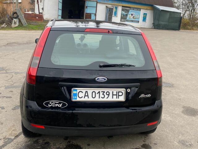 Черный Форд Фиеста, объемом двигателя 1.4 л и пробегом 160 тыс. км за 3600 $, фото 4 на Automoto.ua