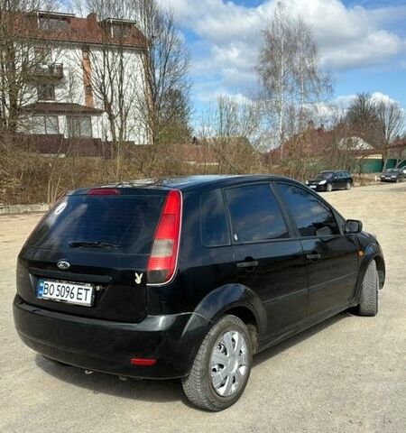 Черный Форд Фиеста, объемом двигателя 1.4 л и пробегом 314 тыс. км за 2950 $, фото 3 на Automoto.ua