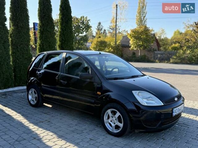 Черный Форд Фиеста, объемом двигателя 1.4 л и пробегом 155 тыс. км за 2999 $, фото 1 на Automoto.ua