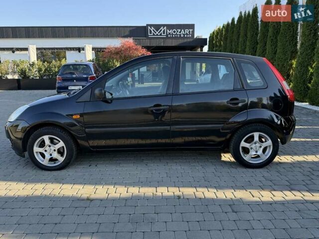 Черный Форд Фиеста, объемом двигателя 1.4 л и пробегом 155 тыс. км за 2999 $, фото 7 на Automoto.ua