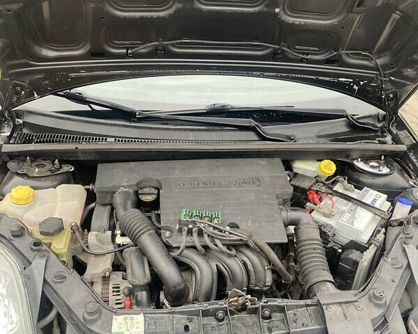 Черный Форд Фиеста, объемом двигателя 1.39 л и пробегом 180 тыс. км за 3600 $, фото 11 на Automoto.ua