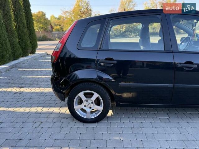 Черный Форд Фиеста, объемом двигателя 1.4 л и пробегом 155 тыс. км за 2999 $, фото 12 на Automoto.ua