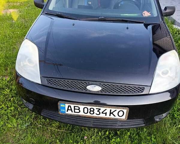 Черный Форд Фиеста, объемом двигателя 1.4 л и пробегом 265 тыс. км за 3200 $, фото 13 на Automoto.ua