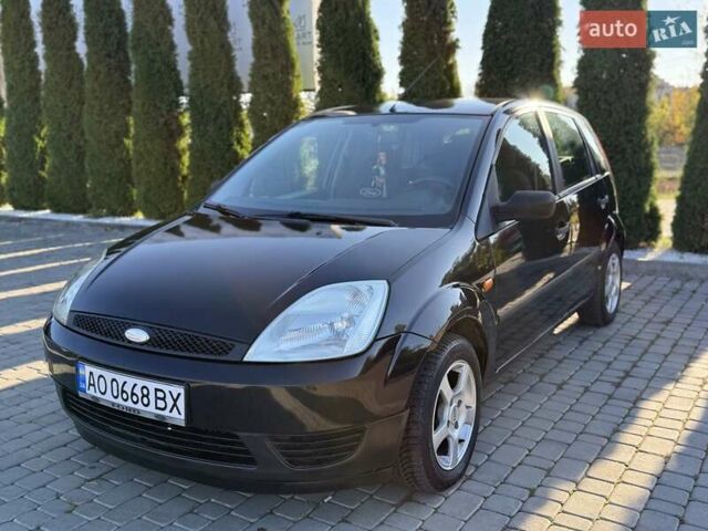 Черный Форд Фиеста, объемом двигателя 1.4 л и пробегом 155 тыс. км за 2999 $, фото 3 на Automoto.ua