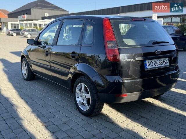 Черный Форд Фиеста, объемом двигателя 1.4 л и пробегом 155 тыс. км за 2999 $, фото 13 на Automoto.ua