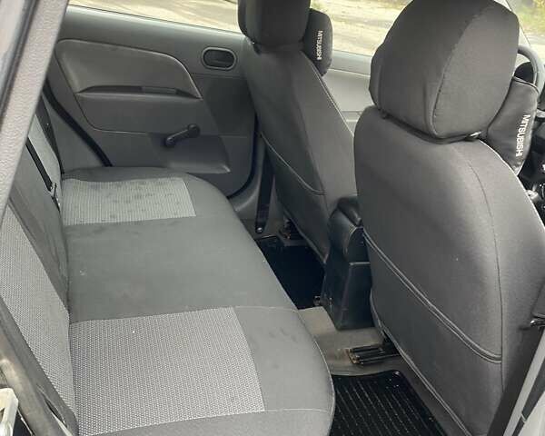 Черный Форд Фиеста, объемом двигателя 1.39 л и пробегом 180 тыс. км за 3600 $, фото 10 на Automoto.ua