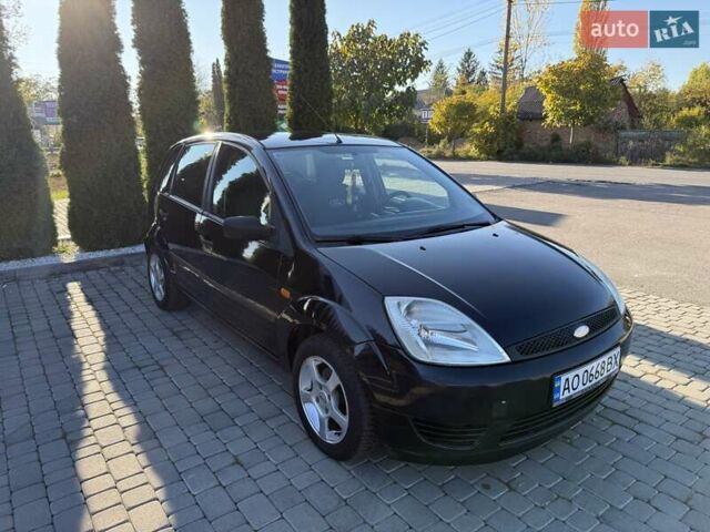 Черный Форд Фиеста, объемом двигателя 1.4 л и пробегом 155 тыс. км за 2999 $, фото 2 на Automoto.ua