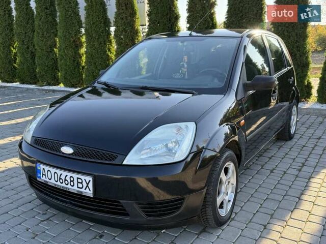 Черный Форд Фиеста, объемом двигателя 1.4 л и пробегом 155 тыс. км за 2999 $, фото 5 на Automoto.ua