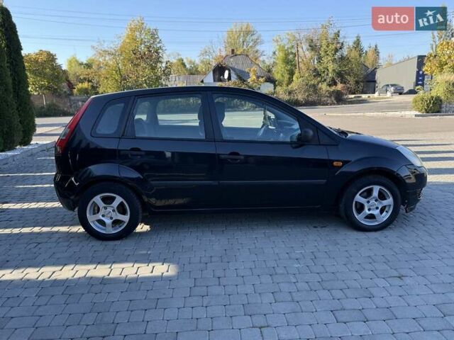 Черный Форд Фиеста, объемом двигателя 1.4 л и пробегом 155 тыс. км за 2999 $, фото 10 на Automoto.ua