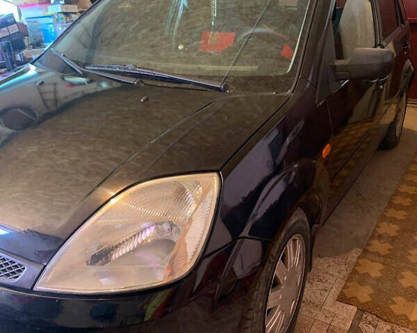 Чорний Форд Фієста, об'ємом двигуна 1.3 л та пробігом 175 тис. км за 3200 $, фото 17 на Automoto.ua