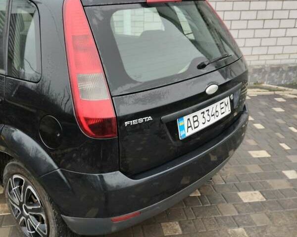 Черный Форд Фиеста, объемом двигателя 1.3 л и пробегом 218 тыс. км за 3900 $, фото 2 на Automoto.ua