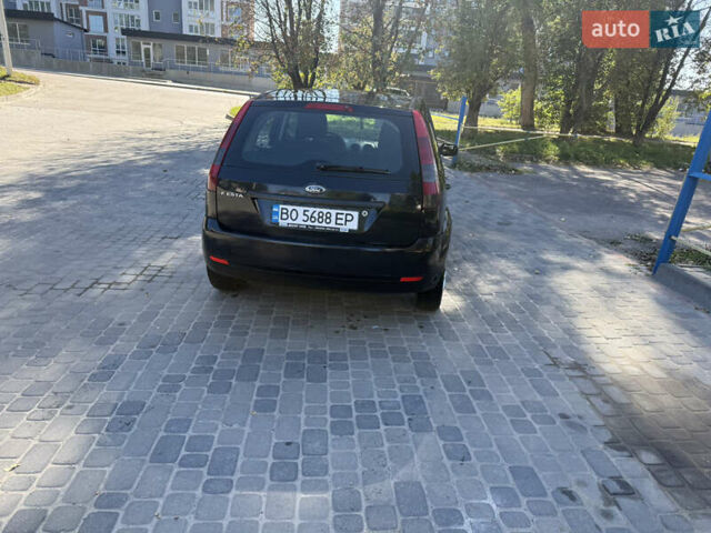 Чорний Форд Фієста, об'ємом двигуна 1.3 л та пробігом 242 тис. км за 3250 $, фото 7 на Automoto.ua
