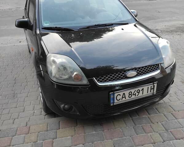 Чорний Форд Фієста, об'ємом двигуна 1.4 л та пробігом 182 тис. км за 4250 $, фото 1 на Automoto.ua