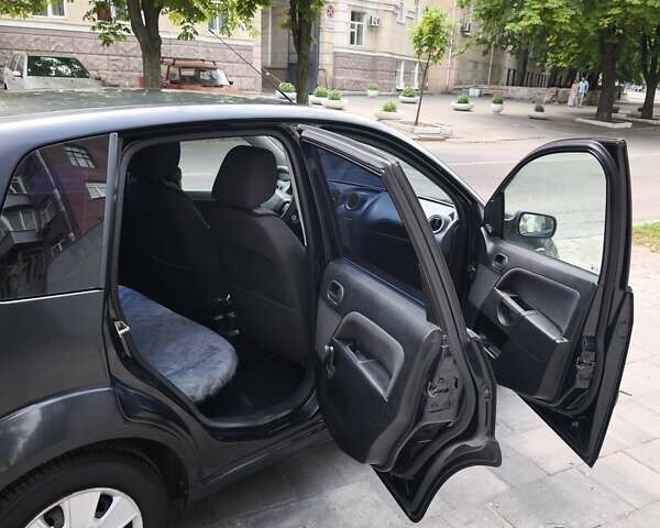 Форд Фиеста 2006 в Днепре (Днепропетровске) на Automoto.ua Черный Форд Фиеста, объемом двигателя 1.3 л и пробегом 150 тыс. км за 4500 $, фото 6 на Automoto.ua