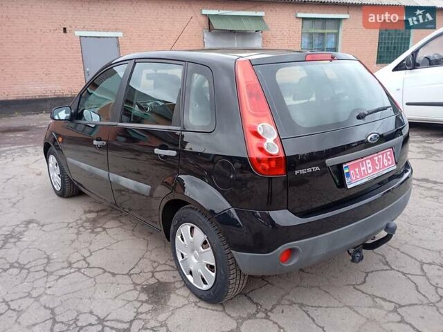 Черный Форд Фиеста, объемом двигателя 1.3 л и пробегом 217 тыс. км за 4150 $, фото 10 на Automoto.ua