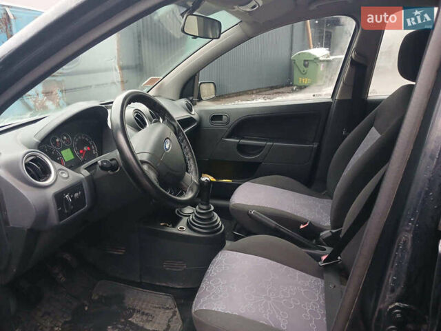 Черный Форд Фиеста, объемом двигателя 0 л и пробегом 184 тыс. км за 3590 $, фото 9 на Automoto.ua