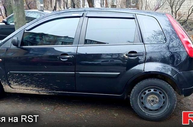 Черный Форд Фиеста, объемом двигателя 1.2 л и пробегом 288 тыс. км за 3500 $, фото 2 на Automoto.ua