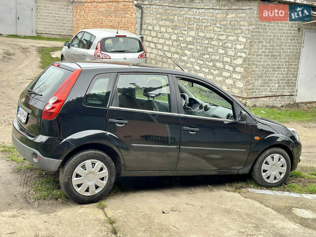 Черный Форд Фиеста, объемом двигателя 1.4 л и пробегом 260 тыс. км за 3650 $, фото 14 на Automoto.ua