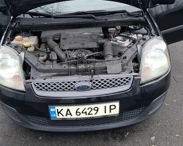 Черный Форд Фиеста, объемом двигателя 1.4 л и пробегом 241 тыс. км за 3800 $, фото 2 на Automoto.ua