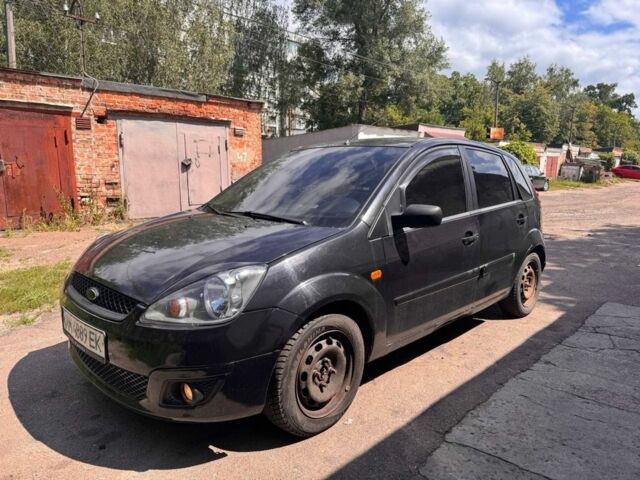 Черный Форд Фиеста, объемом двигателя 1.4 л и пробегом 200 тыс. км за 3300 $, фото 1 на Automoto.ua
