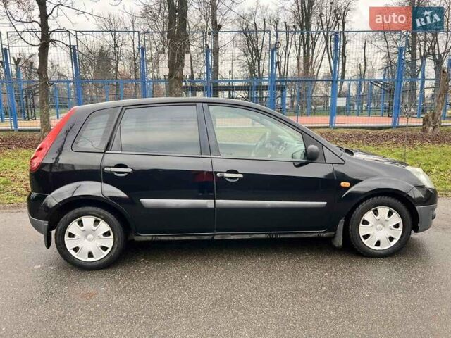 Черный Форд Фиеста, объемом двигателя 1.39 л и пробегом 210 тыс. км за 3750 $, фото 10 на Automoto.ua