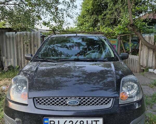 Черный Форд Фиеста, объемом двигателя 1.39 л и пробегом 231 тыс. км за 3900 $, фото 2 на Automoto.ua