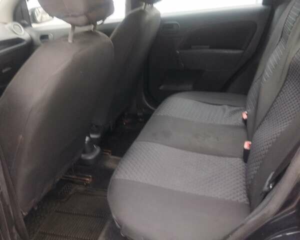 Черный Форд Фиеста, объемом двигателя 1.39 л и пробегом 247 тыс. км за 3000 $, фото 2 на Automoto.ua