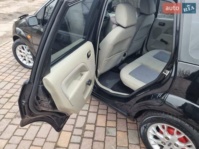 Черный Форд Фиеста, объемом двигателя 1.4 л и пробегом 233 тыс. км за 4650 $, фото 11 на Automoto.ua