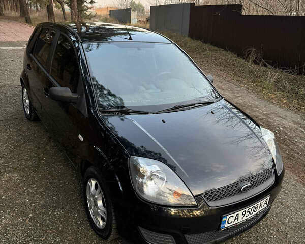 Черный Форд Фиеста, объемом двигателя 1.3 л и пробегом 276 тыс. км за 4300 $, фото 6 на Automoto.ua