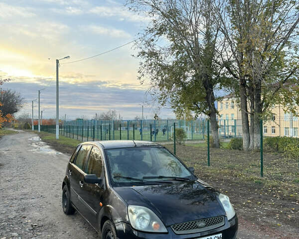 Черный Форд Фиеста, объемом двигателя 1.24 л и пробегом 367 тыс. км за 1850 $, фото 6 на Automoto.ua