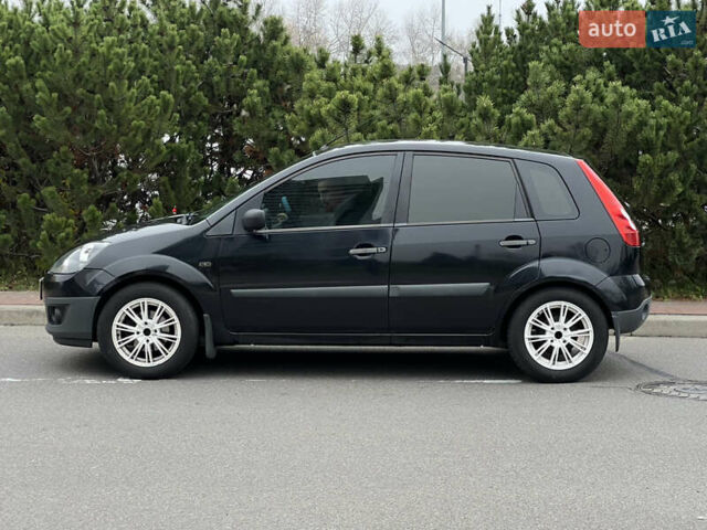 Черный Форд Фиеста, объемом двигателя 1.3 л и пробегом 251 тыс. км за 3500 $, фото 10 на Automoto.ua