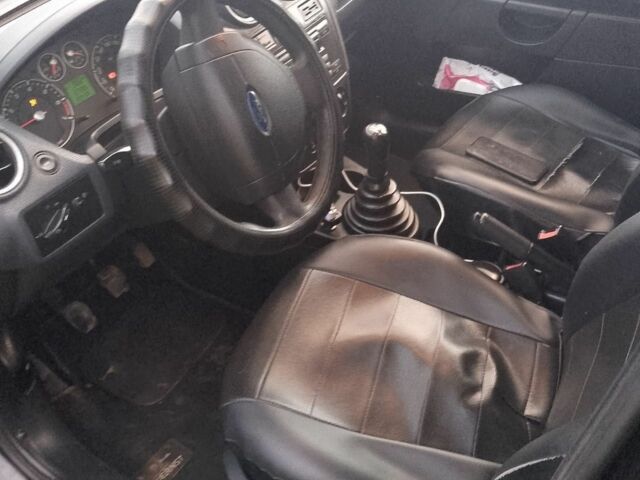 Черный Форд Фиеста, объемом двигателя 1.3 л и пробегом 230 тыс. км за 2500 $, фото 8 на Automoto.ua