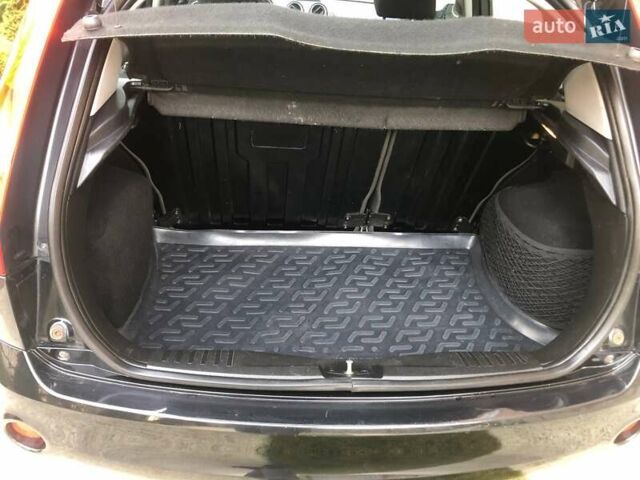 Черный Форд Фиеста, объемом двигателя 1.39 л и пробегом 234 тыс. км за 4400 $, фото 18 на Automoto.ua