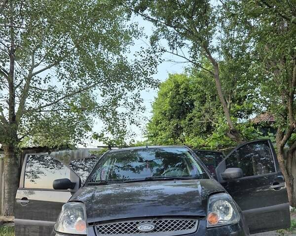 Черный Форд Фиеста, объемом двигателя 1.39 л и пробегом 231 тыс. км за 3900 $, фото 3 на Automoto.ua