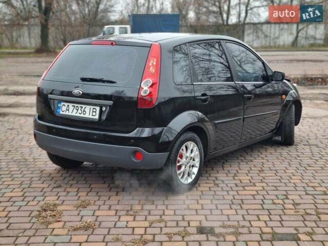 Черный Форд Фиеста, объемом двигателя 1.4 л и пробегом 233 тыс. км за 4650 $, фото 5 на Automoto.ua