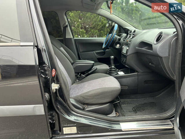 Черный Форд Фиеста, объемом двигателя 1.3 л и пробегом 251 тыс. км за 3500 $, фото 51 на Automoto.ua